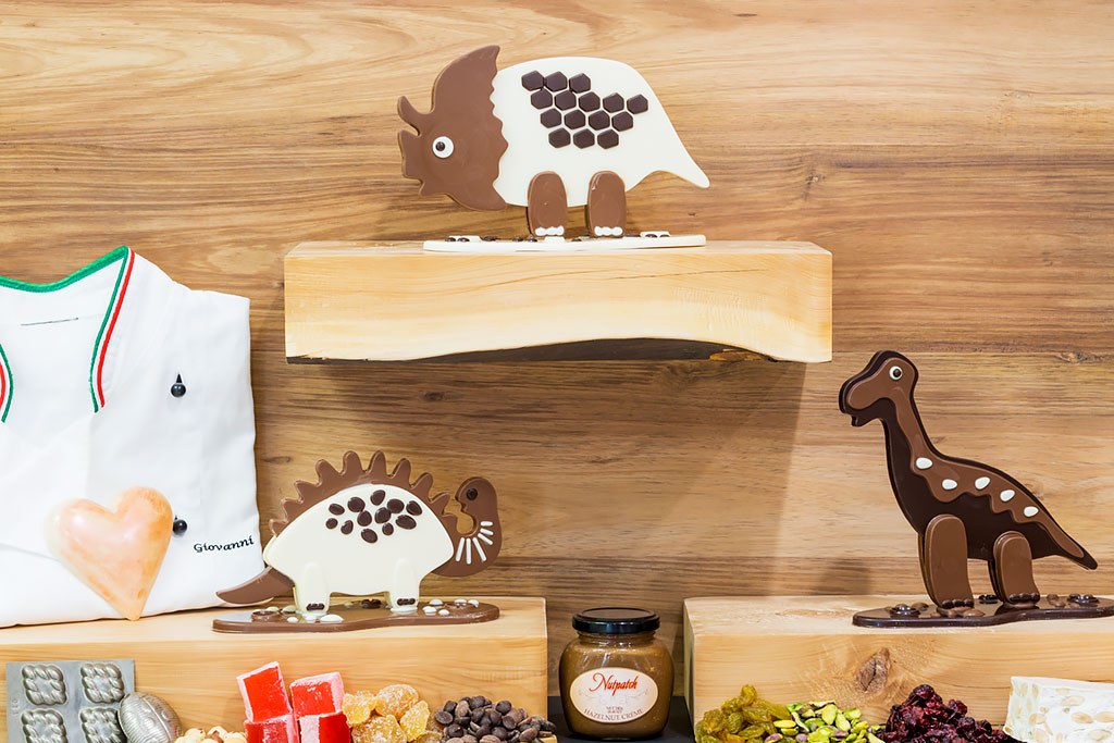 Three chocolate dinosaurs.