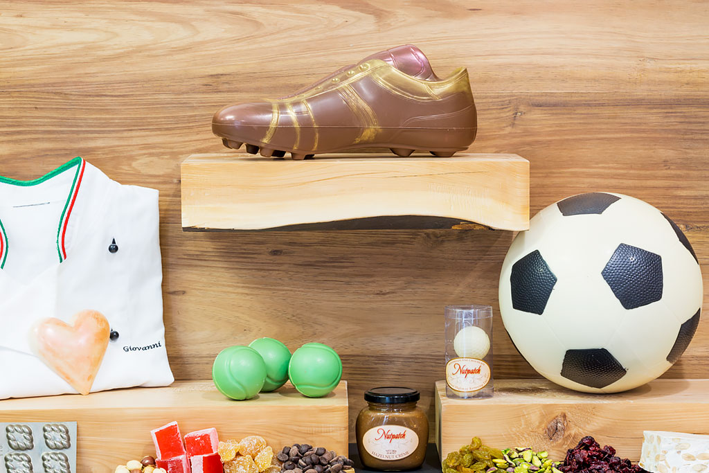 Soccer ball, soccer boot, tennis and golf enthusiasts.